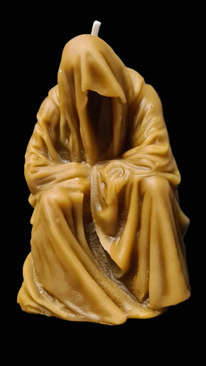 monje con capa de cera de miel